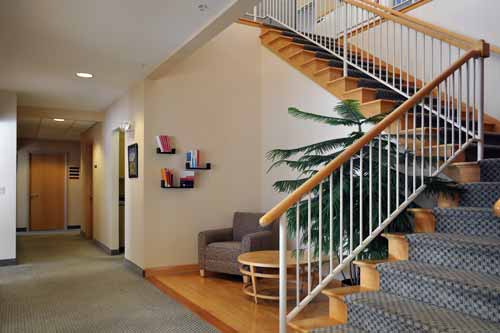 Staircase adjacent to atrium